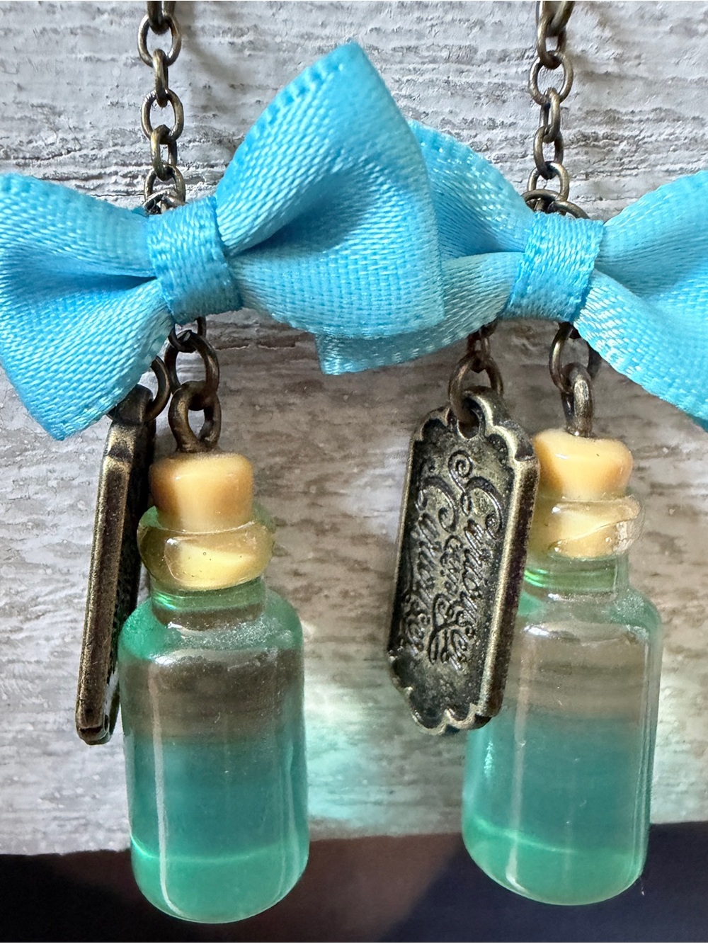 Alice in wonderland - Disney Aqua Bottle Charm Earrings with Blue Ribbon Bows